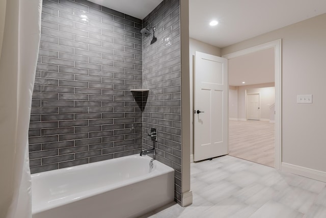 full bathroom with recessed lighting, shower / bathing tub combination, and baseboards