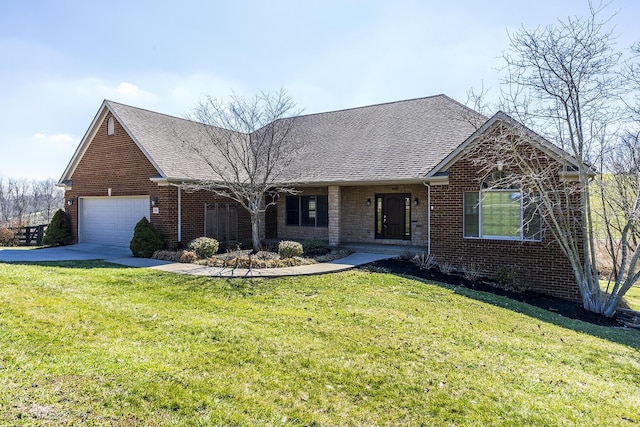 ranch-style home featuring a garage, a front yard, and brick siding