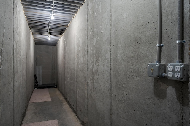 corridor featuring concrete floors