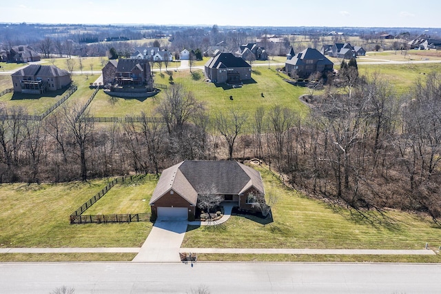 birds eye view of property with a rural view