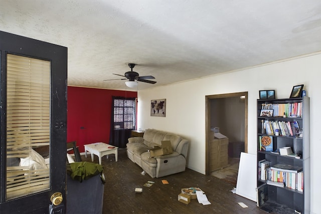 living area featuring ceiling fan and wood finished floors