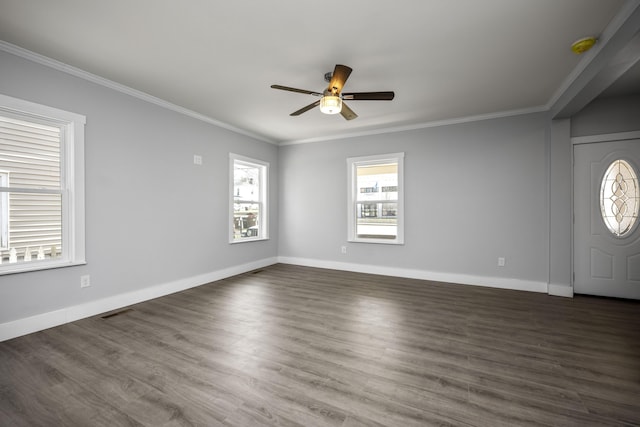 entrance foyer with wood finished floors, visible vents, baseboards, ceiling fan, and crown molding