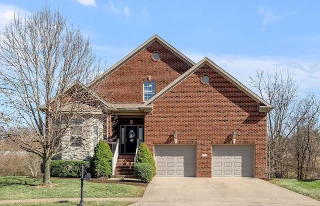 view of front of house featuring a garage, concrete driveway, and brick siding