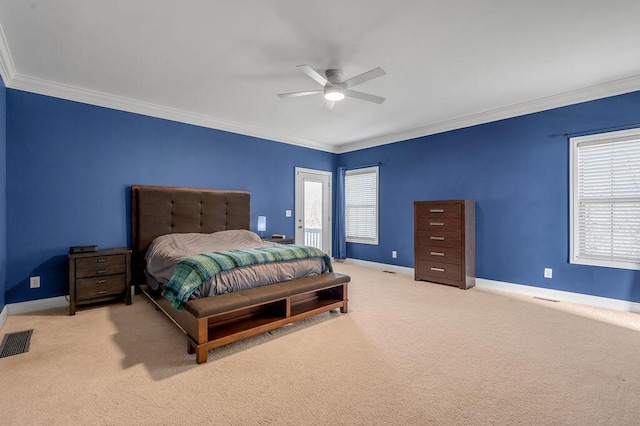 bedroom with ornamental molding, carpet flooring, and visible vents