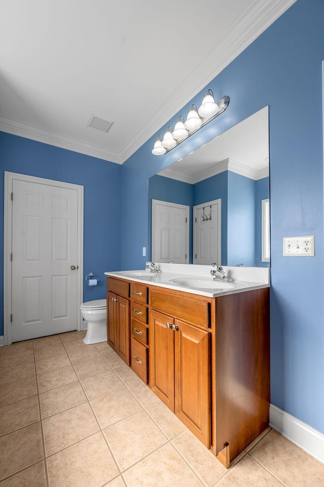 full bathroom with double vanity, visible vents, ornamental molding, tile patterned floors, and a sink