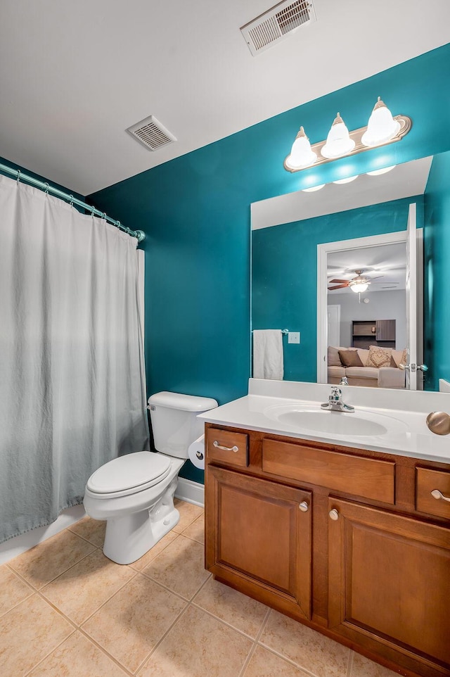 full bathroom with toilet, tile patterned flooring, visible vents, and ensuite bathroom