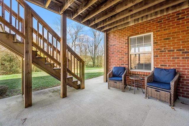 view of patio featuring stairway