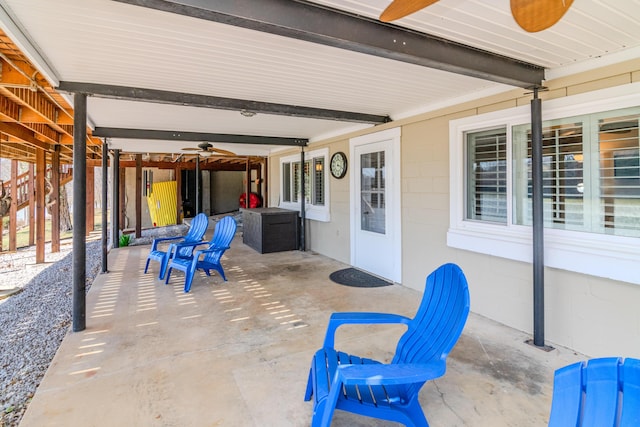 view of patio featuring a ceiling fan