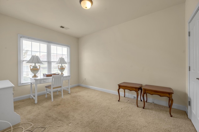 home office featuring carpet, visible vents, and baseboards