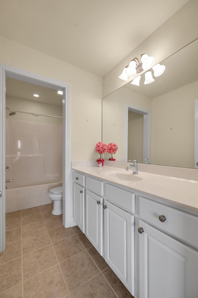 bathroom with shower / bathing tub combination, vanity, toilet, and tile patterned floors