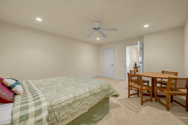 bedroom featuring light carpet, ceiling fan, baseboards, and recessed lighting