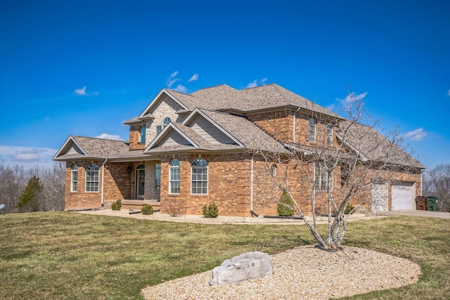 craftsman-style house with brick siding, a shingled roof, concrete driveway, an attached garage, and a front lawn