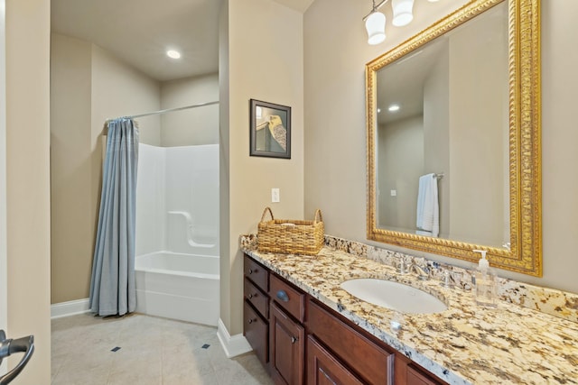 bathroom with baseboards, shower / bath combo, vanity, and tile patterned flooring