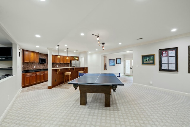 rec room with light carpet, recessed lighting, and baseboards