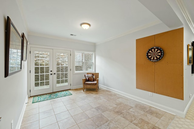 interior space featuring visible vents, french doors, baseboards, and ornamental molding