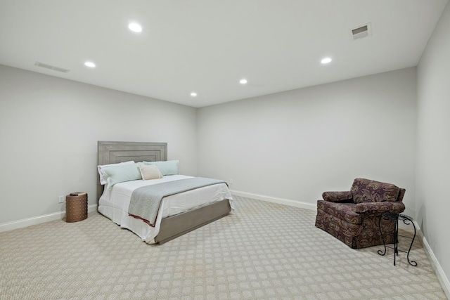 carpeted bedroom with recessed lighting, visible vents, and baseboards