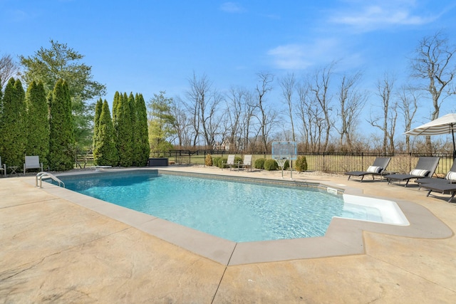 view of pool featuring a patio, fence, and a fenced in pool