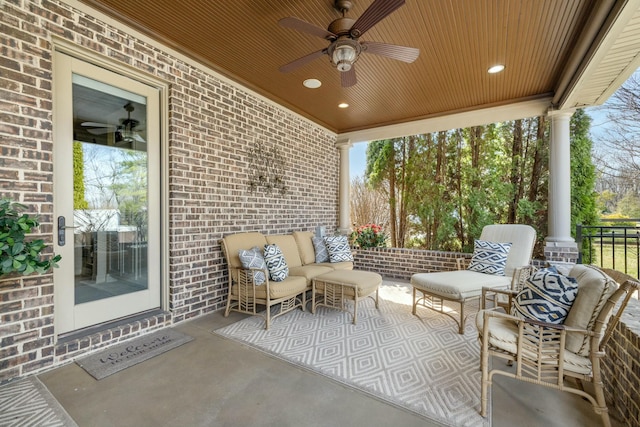 view of patio featuring outdoor lounge area and a ceiling fan