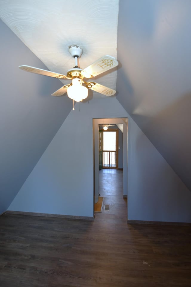 bonus room with ceiling fan, visible vents, vaulted ceiling, and wood finished floors