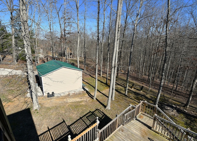 view of yard with an outbuilding and a deck