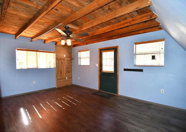 foyer entrance featuring ceiling fan, lofted ceiling with beams, wooden ceiling, wood finished floors, and baseboards