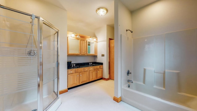 full bathroom featuring  shower combination and vanity