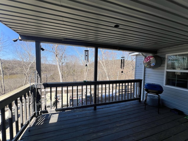 wooden deck featuring area for grilling