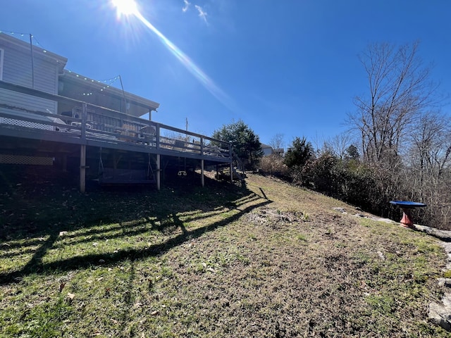 view of yard with a deck