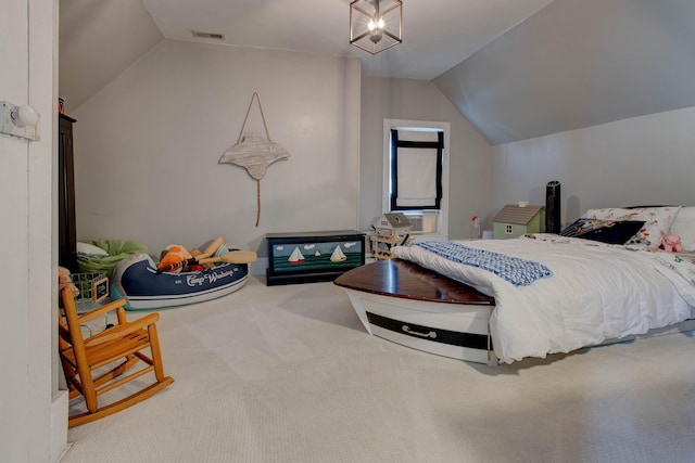 carpeted bedroom with a chandelier, lofted ceiling, and visible vents