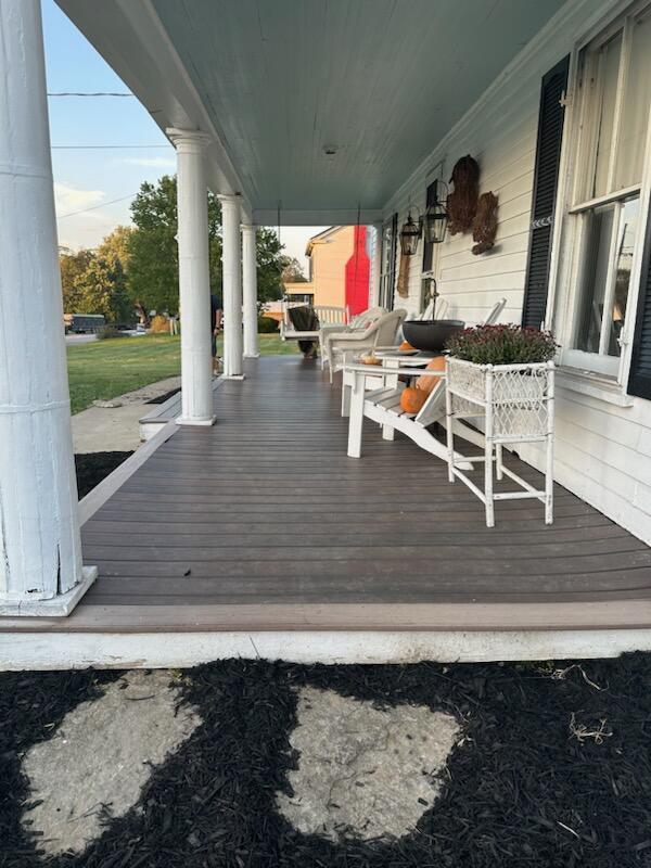 wooden deck featuring a porch