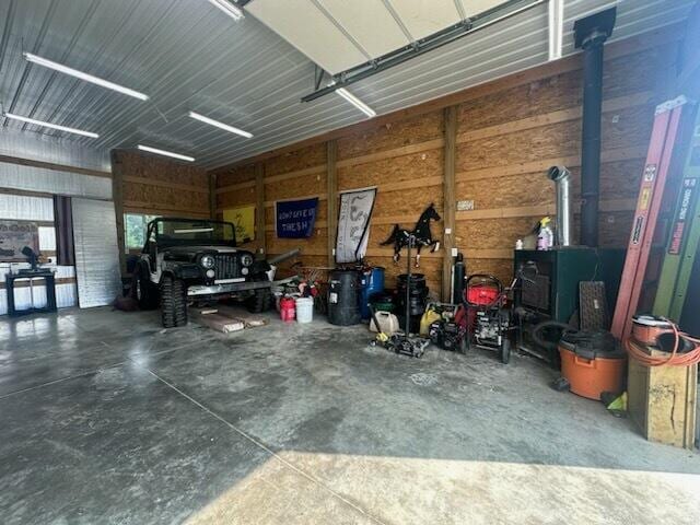 garage featuring a wood stove