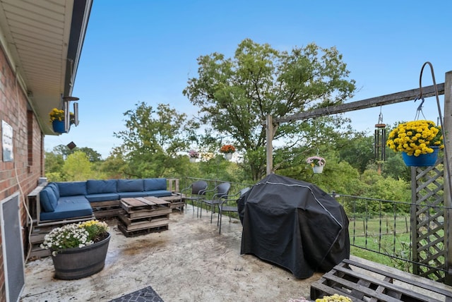 view of patio with a grill and outdoor lounge area