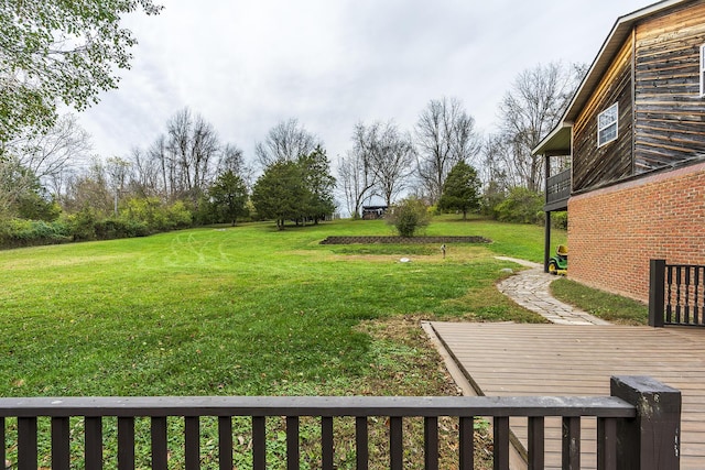 view of yard featuring a deck