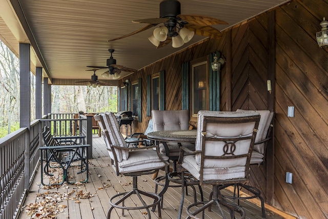 wooden deck with ceiling fan