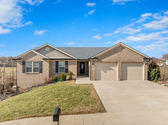 ranch-style home featuring a front lawn, brick siding, driveway, and an attached garage