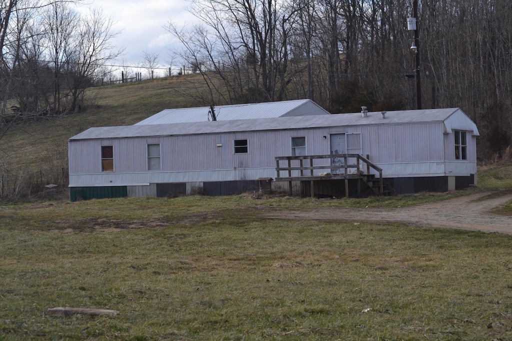 3235 N Stepstone Rd, Owingsville, KY 40360 - view of front of property with a front lawn