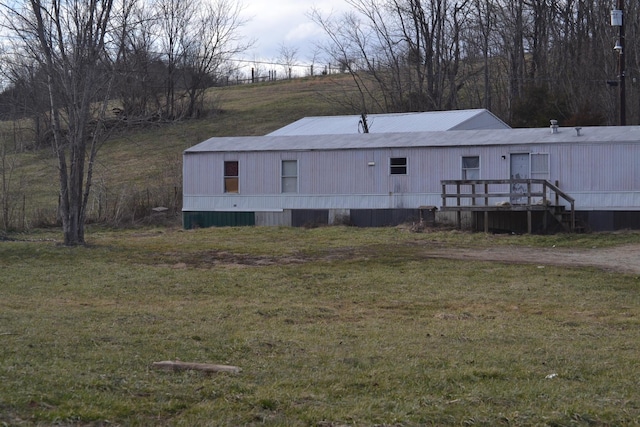 view of front of home with a front yard