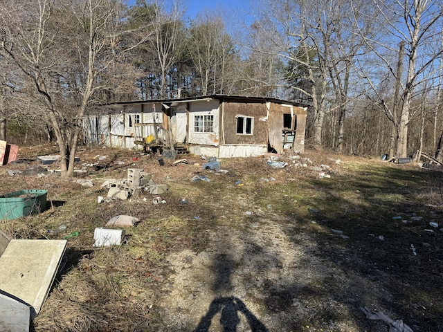 manufactured / mobile home featuring stucco siding