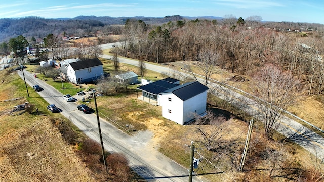 aerial view with a wooded view