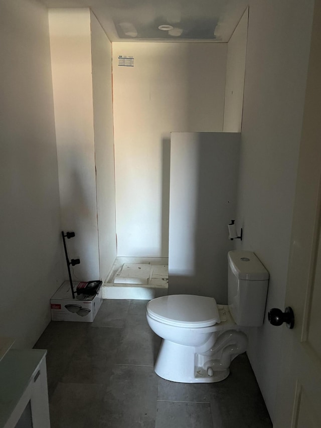 bathroom featuring toilet