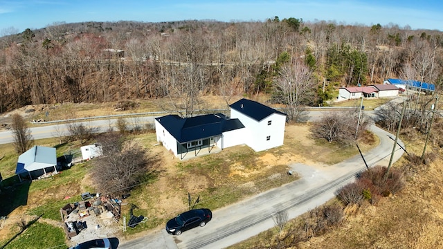 aerial view featuring a forest view