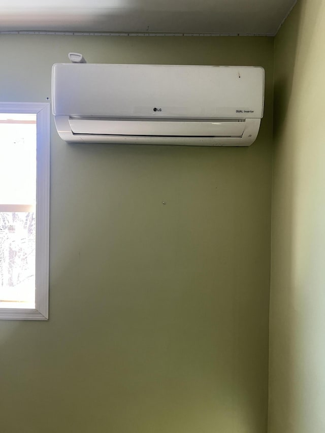 interior details featuring a wall mounted air conditioner