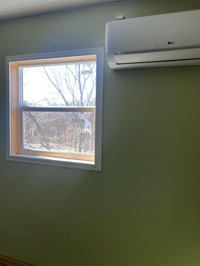 interior details with a wall mounted air conditioner