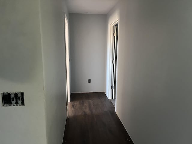 corridor with dark wood finished floors