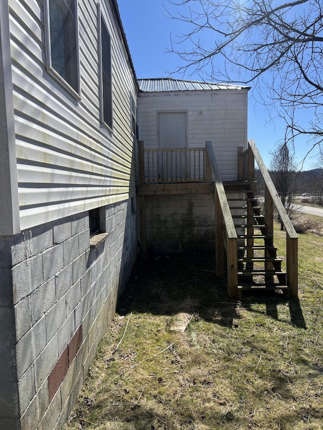 view of home's exterior with metal roof