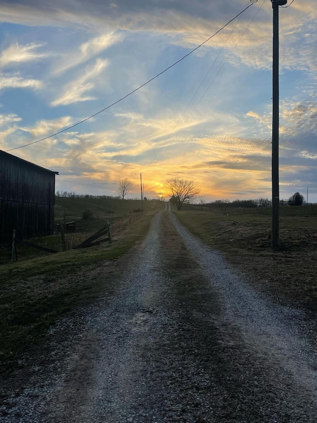 view of road with a rural view