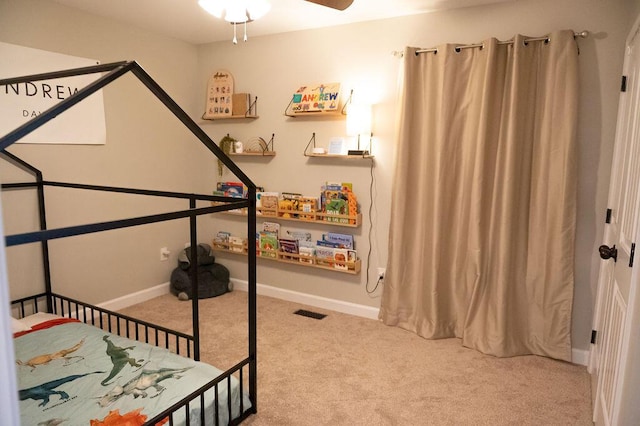 bedroom featuring carpet, visible vents, and baseboards