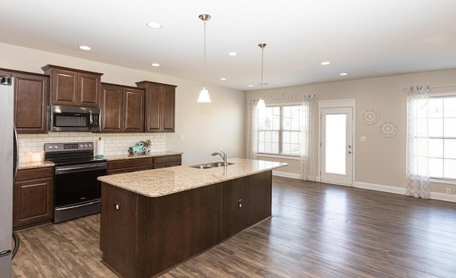 111 Mcintosh Park, Georgetown, KY 40324 - kitchen with range with electric cooktop, a sink, stainless steel microwave, tasteful backsplash, and dark wood-style floors