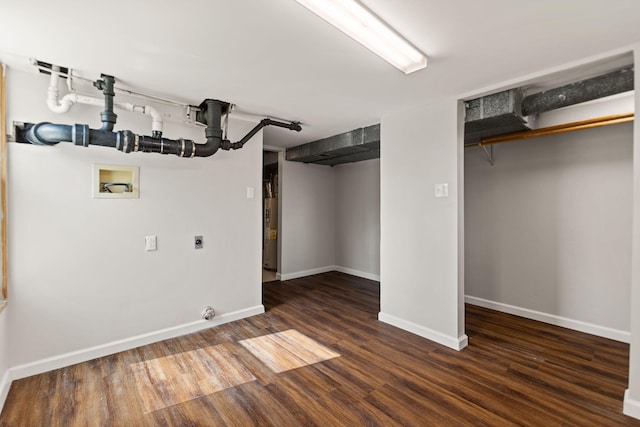 finished basement featuring wood finished floors and baseboards