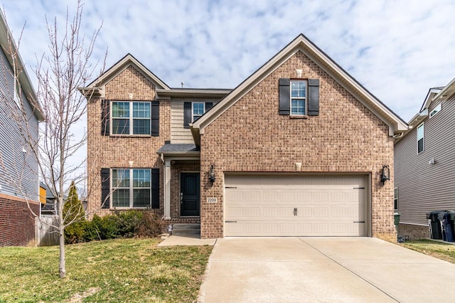 traditional home featuring a garage, a front yard, brick siding, and driveway